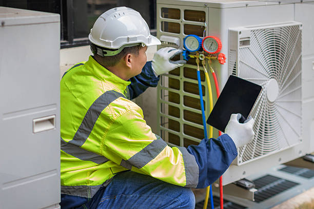 Professional Ac Installation technician working in Harrah, WA